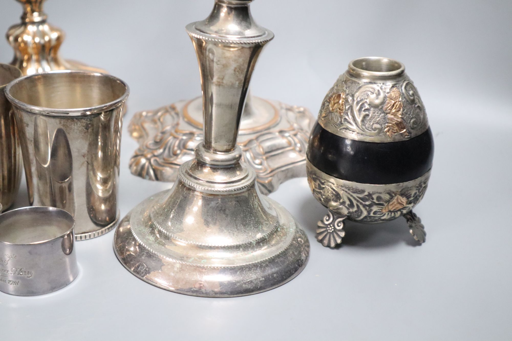 Assorted plated ware including candlesticks, trumpet vase etc.